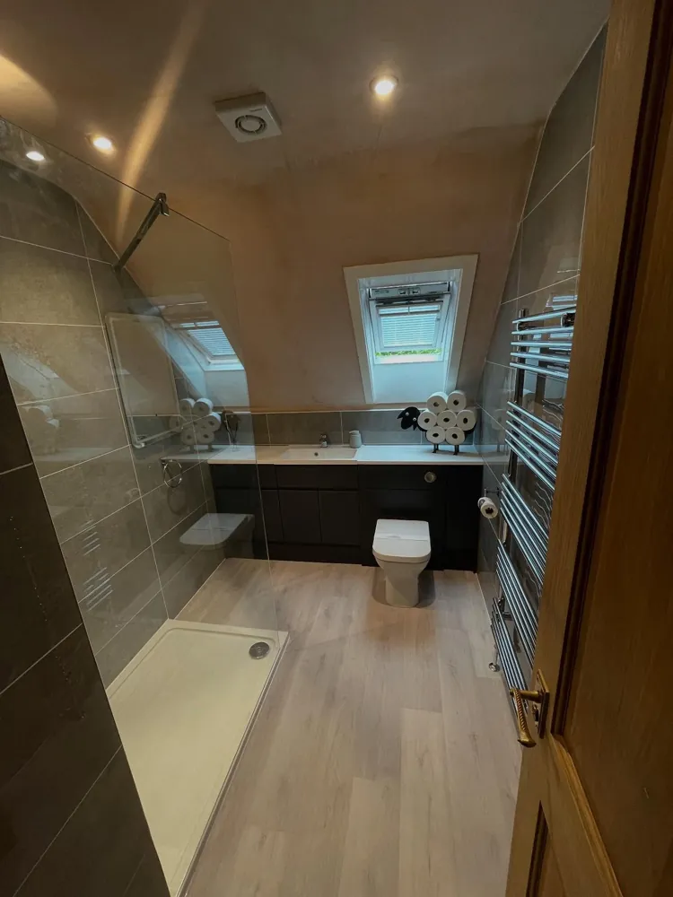 A new bathroom we installed in Cardiff, with walk-in shower and heated towel rail
