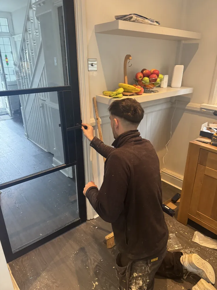 One of our team fitting a kitchen